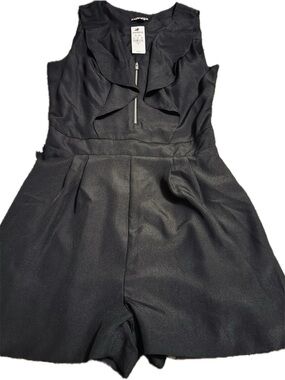 EXP Ruffle Romper w/Front Zip. 
Black Sleeveless
So Cute! Don’t Miss out!